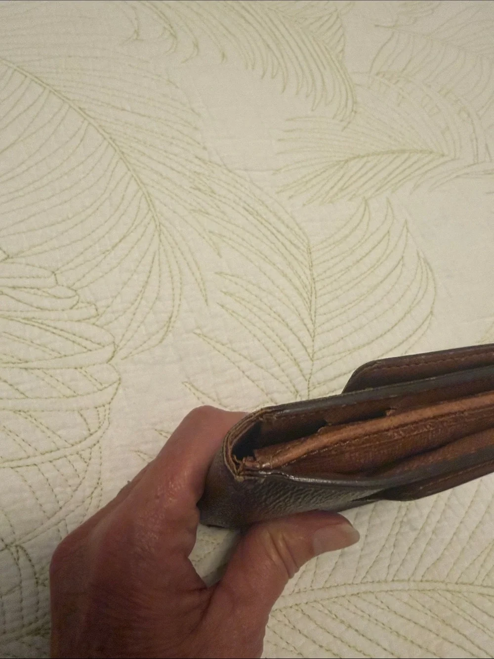 Louis Vuitton trifold snap wallet. Authentication provided.